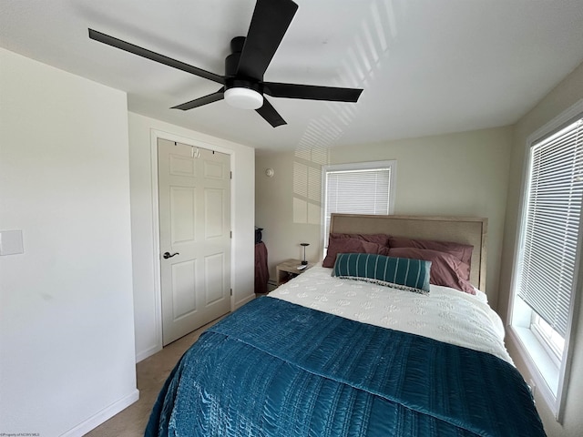 420 Fairfax Ave, Davis, WV 26260 - bedroom with light colored carpet, a ceiling fan, and baseboards