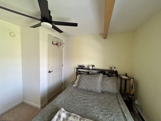 420 Fairfax Ave, Davis, WV 26260 - bedroom with a ceiling fan, beamed ceiling, baseboards, and carpet