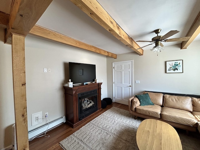 420 Fairfax Ave, Davis, WV 26260 - living room with beam ceiling, wood finished floors, a ceiling fan, decorative columns, and a fireplace