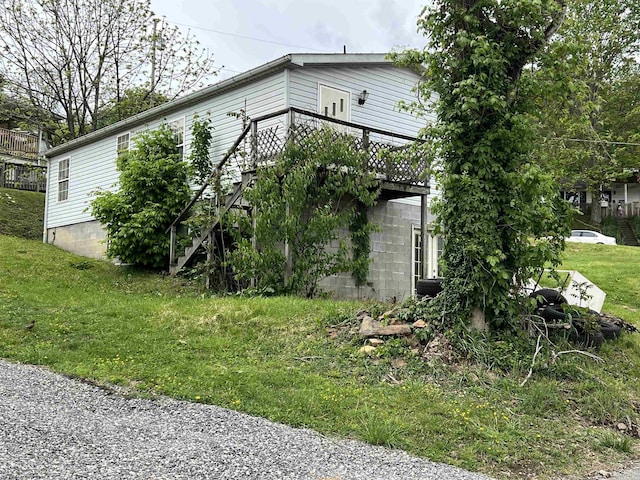 209 Thomas Ave, Nutter Fort, WV 26301 - view of side of property with a deck and a yard