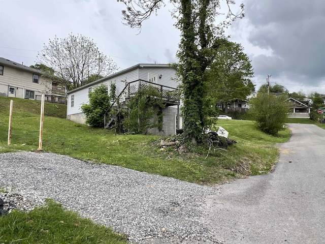 209 Thomas Ave, Nutter Fort, WV 26301 - view of side of home featuring a yard