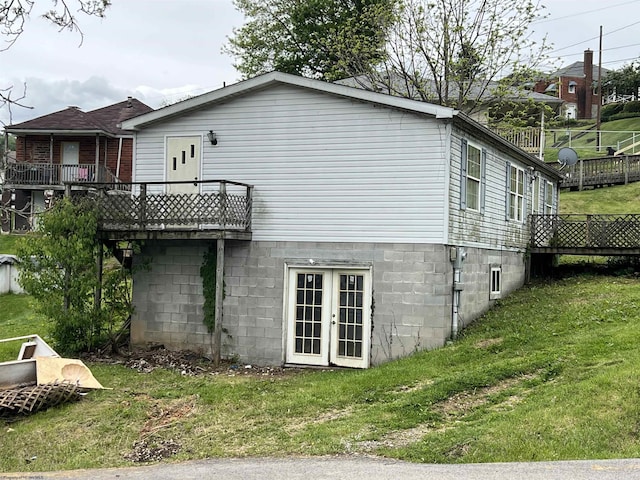 209 Thomas Ave, Nutter Fort, WV 26301 - view of side of property with a yard, french doors, and a deck