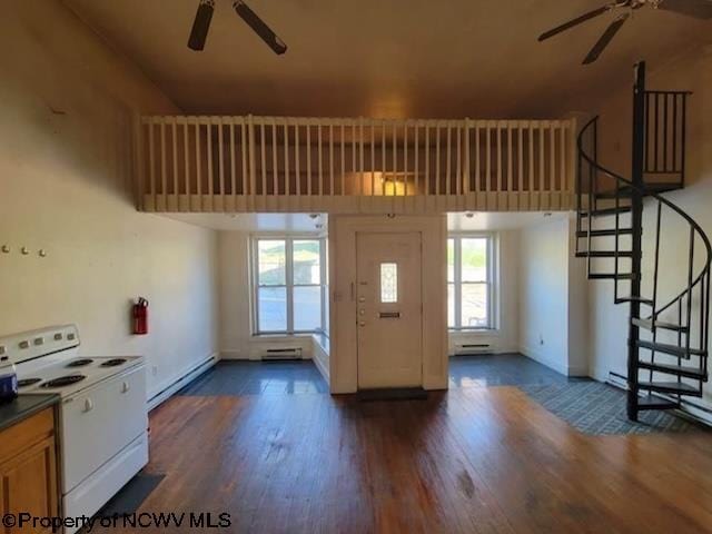140 Locust Ave Unit 6, Fairmont, WV 26554 - entryway featuring ceiling fan, a baseboard heating unit, plenty of natural light, and dark wood-style floors