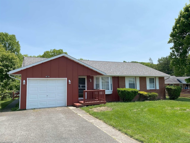 206 Evergreen Dr, Elkins, WV 26241 - ranch-style home with an attached garage, a front lawn, a shingled roof, and asphalt driveway
