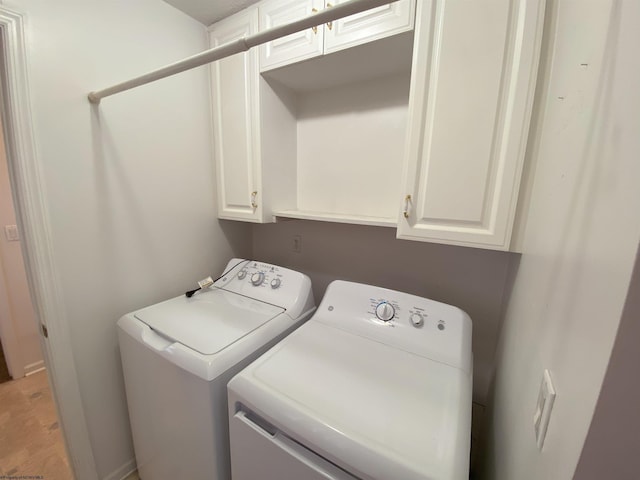 206 Evergreen Dr, Elkins, WV 26241 - laundry area with independent washer and dryer and cabinet space