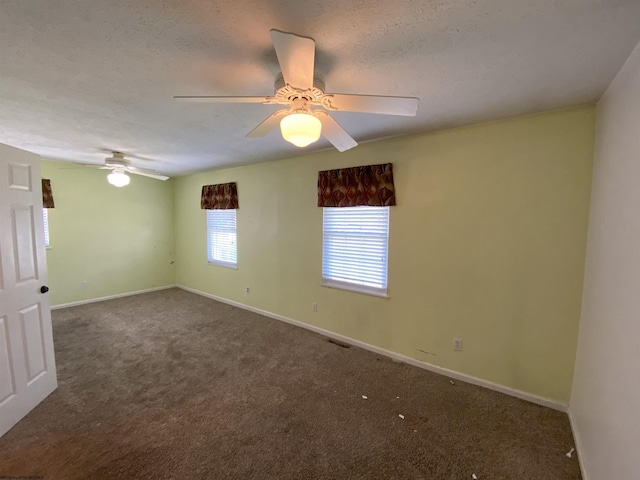 206 Evergreen Dr, Elkins, WV 26241 - spare room featuring carpet flooring, ceiling fan, baseboards, and a textured ceiling