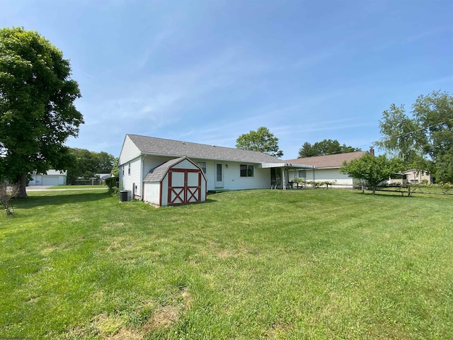 206 Evergreen Dr, Elkins, WV 26241 - back of house featuring a lawn and cooling unit