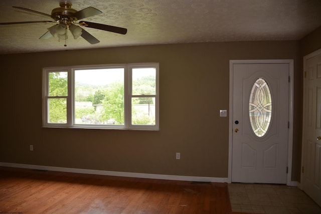 84 Chapman Ln, Weston, WV 26452 - entryway with baseboards, a ceiling fan, and light wood-style flooring