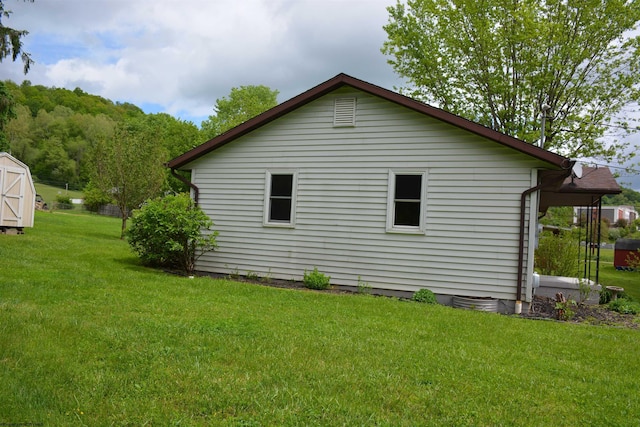 84 Chapman Ln, Weston, WV 26452 - view of property exterior with a yard
