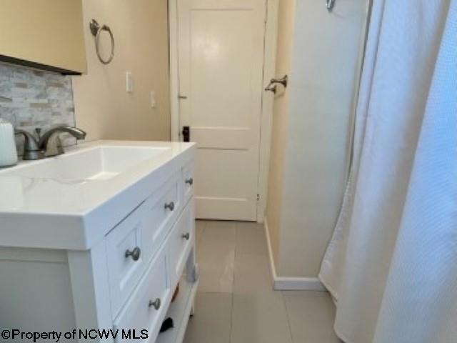 5 Key St, Elkins, WV 26241 - bathroom featuring tile patterned floors and vanity