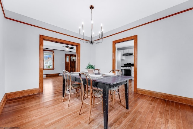 303 Saint Clair St, Clarksburg, WV 26301 - dining area with baseboards, a chandelier, light wood-style floors, and crown molding