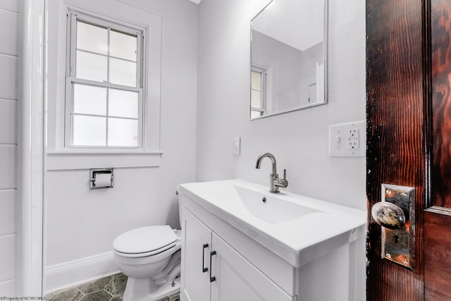 303 Saint Clair St, Clarksburg, WV 26301 - half bath with vanity, toilet, and baseboards