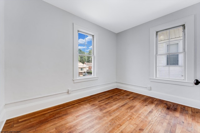 303 Saint Clair St, Clarksburg, WV 26301 - spare room featuring hardwood / wood-style floors and baseboards