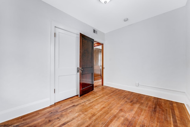 303 Saint Clair St, Clarksburg, WV 26301 - unfurnished bedroom with wood finished floors and baseboards
