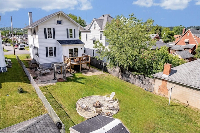 303 Saint Clair St, Clarksburg, WV 26301 - rear view of house with an outdoor fire pit, a patio, a wooden deck, and a chimney