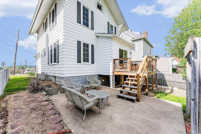 303 Saint Clair St, Clarksburg, WV 26301 - rear view of house featuring a fenced backyard, a deck, a patio area, cooling unit, and stairway