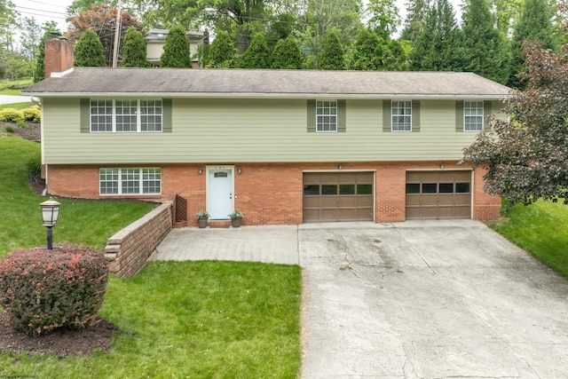 101 Forest Dr, Morgantown, WV 26505 - view of front of home with an attached garage, driveway, a front yard, a chimney, and brick siding