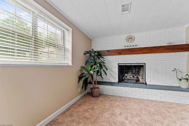 101 Forest Dr, Morgantown, WV 26505 - unfurnished living room with carpet floors, a brick fireplace, and baseboards