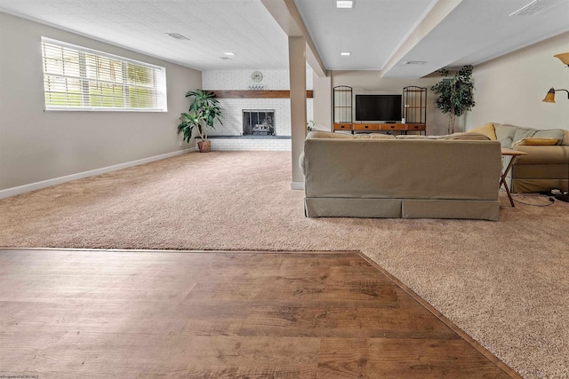 101 Forest Dr, Morgantown, WV 26505 - carpeted living room featuring baseboards and a brick fireplace