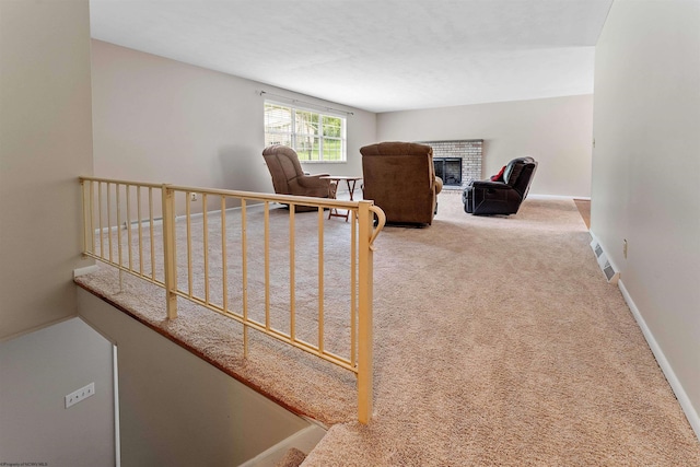 101 Forest Dr, Morgantown, WV 26505 - stairs featuring carpet, a fireplace, and baseboards