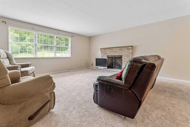 101 Forest Dr, Morgantown, WV 26505 - living room with carpet floors, baseboards, and a brick fireplace
