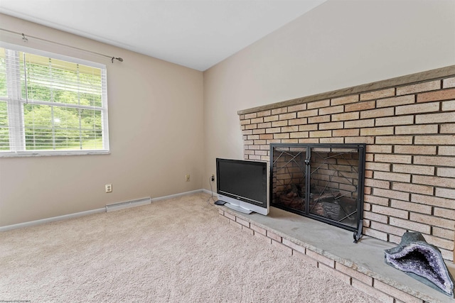 101 Forest Dr, Morgantown, WV 26505 - unfurnished living room featuring carpet, a brick fireplace, baseboards, and baseboard heating