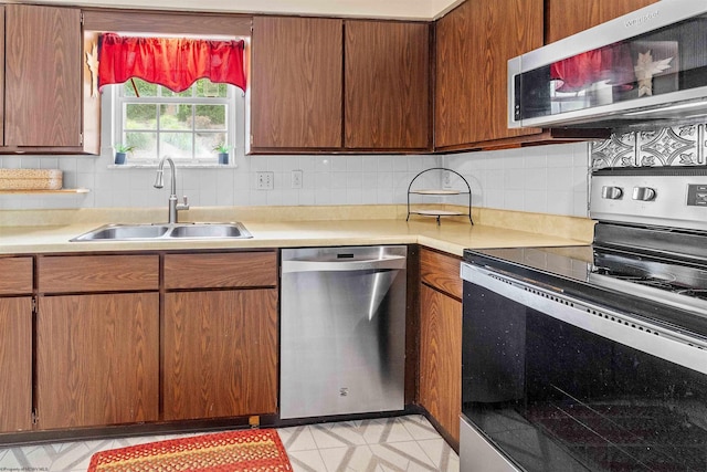 101 Forest Dr, Morgantown, WV 26505 - kitchen featuring appliances with stainless steel finishes, a sink, and light countertops
