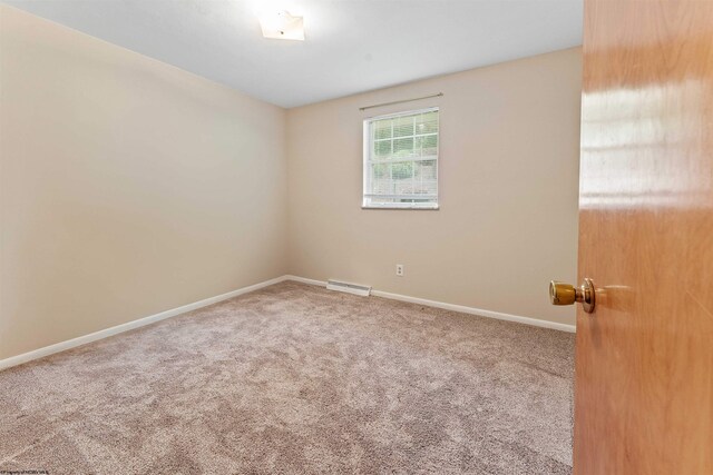 101 Forest Dr, Morgantown, WV 26505 - spare room featuring carpet and baseboards