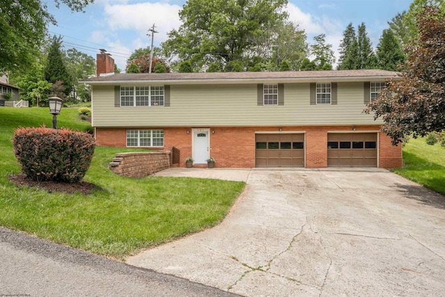 101 Forest Dr, Morgantown, WV 26505 - view of front of property with an attached garage, concrete driveway, brick siding, and a front yard