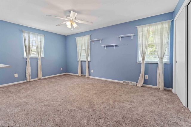101 Forest Dr, Morgantown, WV 26505 - carpeted spare room featuring plenty of natural light, ceiling fan, and baseboards