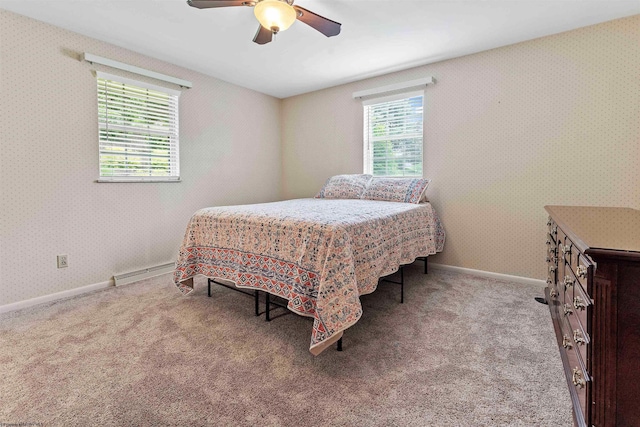 101 Forest Dr, Morgantown, WV 26505 - carpeted bedroom with baseboard heating, a ceiling fan, baseboards, and wallpapered walls