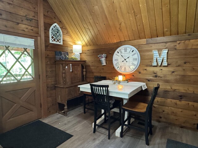 1854 Upper Lamberts Run Rd, Clarksburg, WV 26301 - dining space featuring wood walls, vaulted ceiling, light wood-type flooring, and wooden ceiling