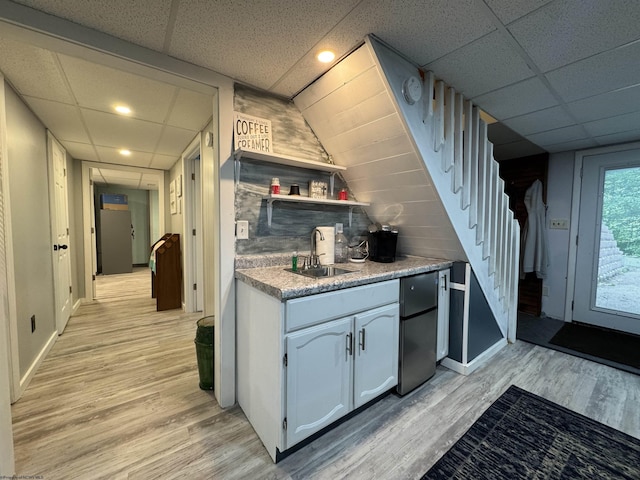 1854 Upper Lamberts Run Rd, Clarksburg, WV 26301 - kitchen with a sink, refrigerator, a paneled ceiling, light wood finished floors, and baseboards