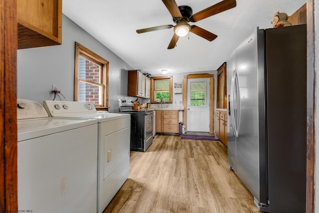 14318 N Preston Hwy, Bruceton Mills, WV 26525 - washroom featuring light wood-style floors, independent washer and dryer, and a ceiling fan