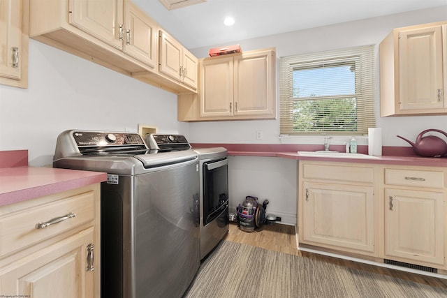 1300 Deer Run, Morgantown, WV 26508 - washroom featuring washing machine and dryer, cabinet space, wood finished floors, and recessed lighting