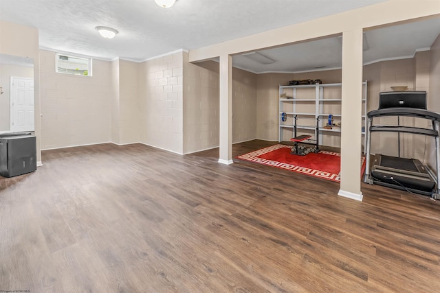 1300 Deer Run, Morgantown, WV 26508 - basement with wood finished floors, concrete block wall, and ornamental molding