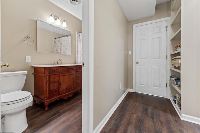 1300 Deer Run, Morgantown, WV 26508 - full bathroom with wood finished floors, vanity, toilet, and baseboards