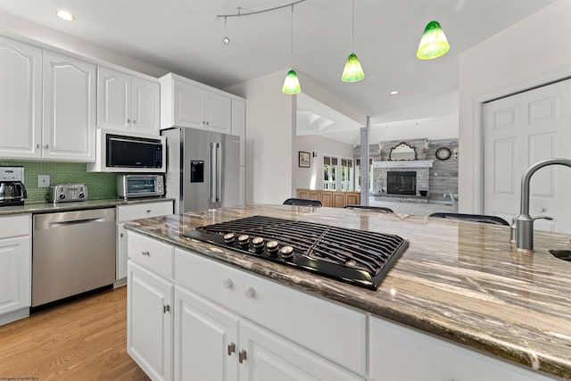 1300 Deer Run, Morgantown, WV 26508 - kitchen with black appliances, dark stone counters, pendant lighting, backsplash, and recessed lighting