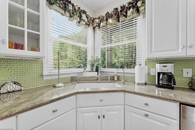 1300 Deer Run, Morgantown, WV 26508 - kitchen with a sink, glass insert cabinets, white cabinets, and decorative backsplash
