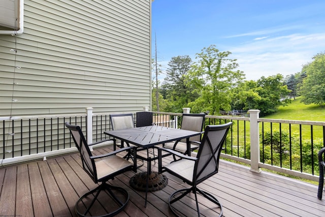 119 Inlet St, Morgantown, WV 26508 - wooden deck with outdoor dining area and view of wooded area