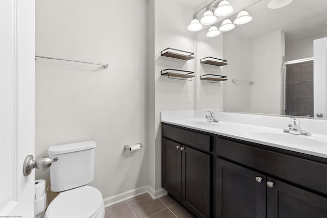 119 Inlet St, Morgantown, WV 26508 - bathroom featuring toilet, tile patterned flooring, double vanity, baseboards, and a shower