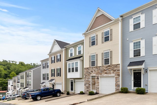 119 Inlet St, Morgantown, WV 26508 - multi unit property featuring stone siding, driveway, and an attached garage