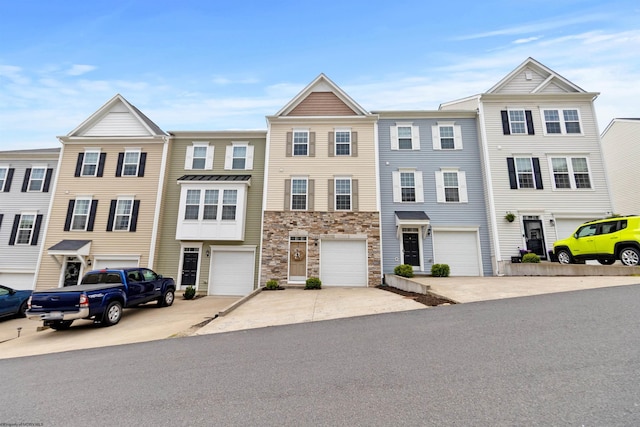 119 Inlet St, Morgantown, WV 26508 - multi unit property with driveway, stone siding, and an attached garage