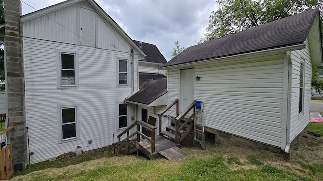 92 N High St, Philippi, WV 26416 - rear view of house featuring entry steps, a shingled roof, and board and batten siding