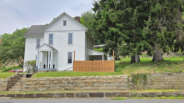 92 N High St, Philippi, WV 26416 - view of front of home with a chimney