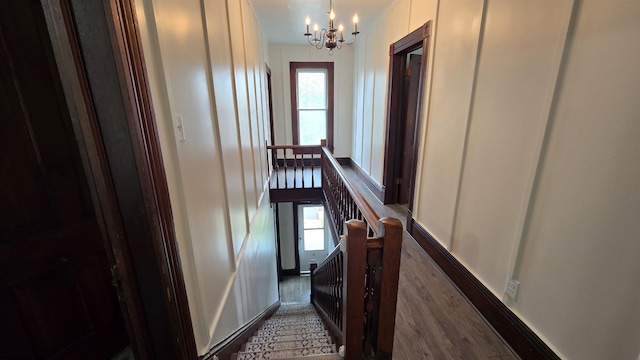 92 N High St, Philippi, WV 26416 - hall featuring an upstairs landing, a chandelier, and wood finished floors
