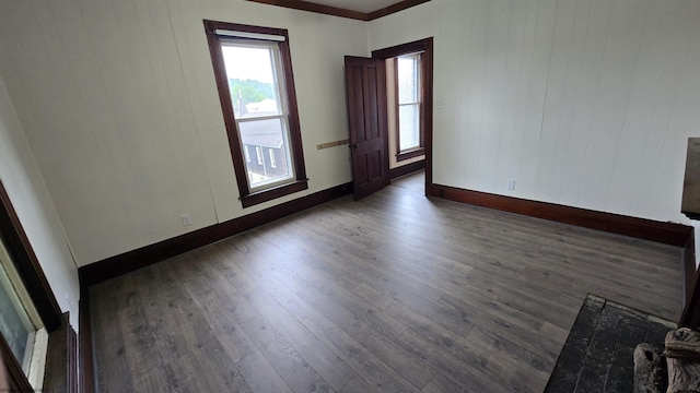 92 N High St, Philippi, WV 26416 - spare room featuring wood finished floors, baseboards, and wooden walls