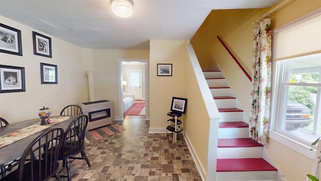 60 Sidetrack Rd Unit 2, Flemington, WV 26424 - stairway featuring heating unit, stone finish flooring, and baseboards