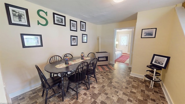 60 Sidetrack Rd Unit 2, Flemington, WV 26424 - dining room with heating unit and baseboards