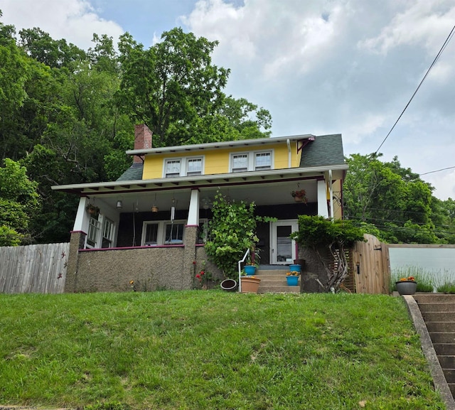 147 E 6th St, Weston, WV 26452 - view of front of property featuring a chimney and covered porch